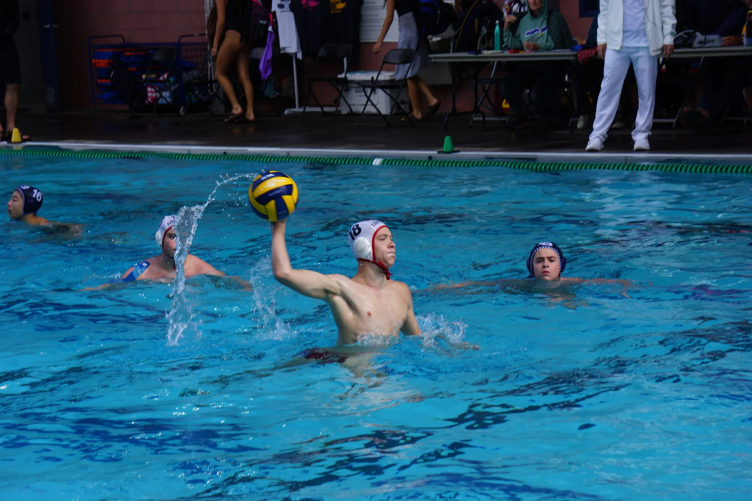 A player shoots during an evening game