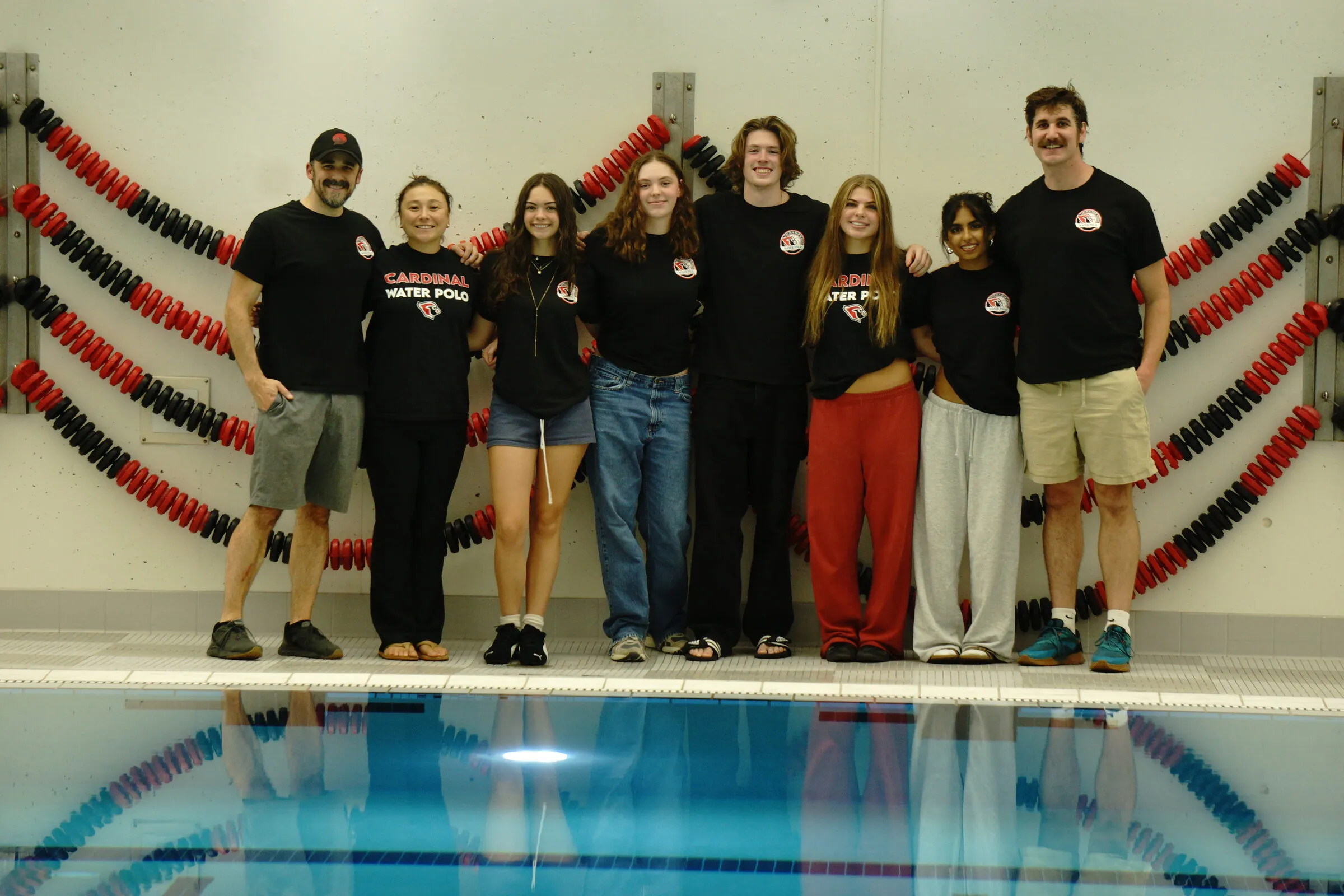 Players and coaches together at the pool
