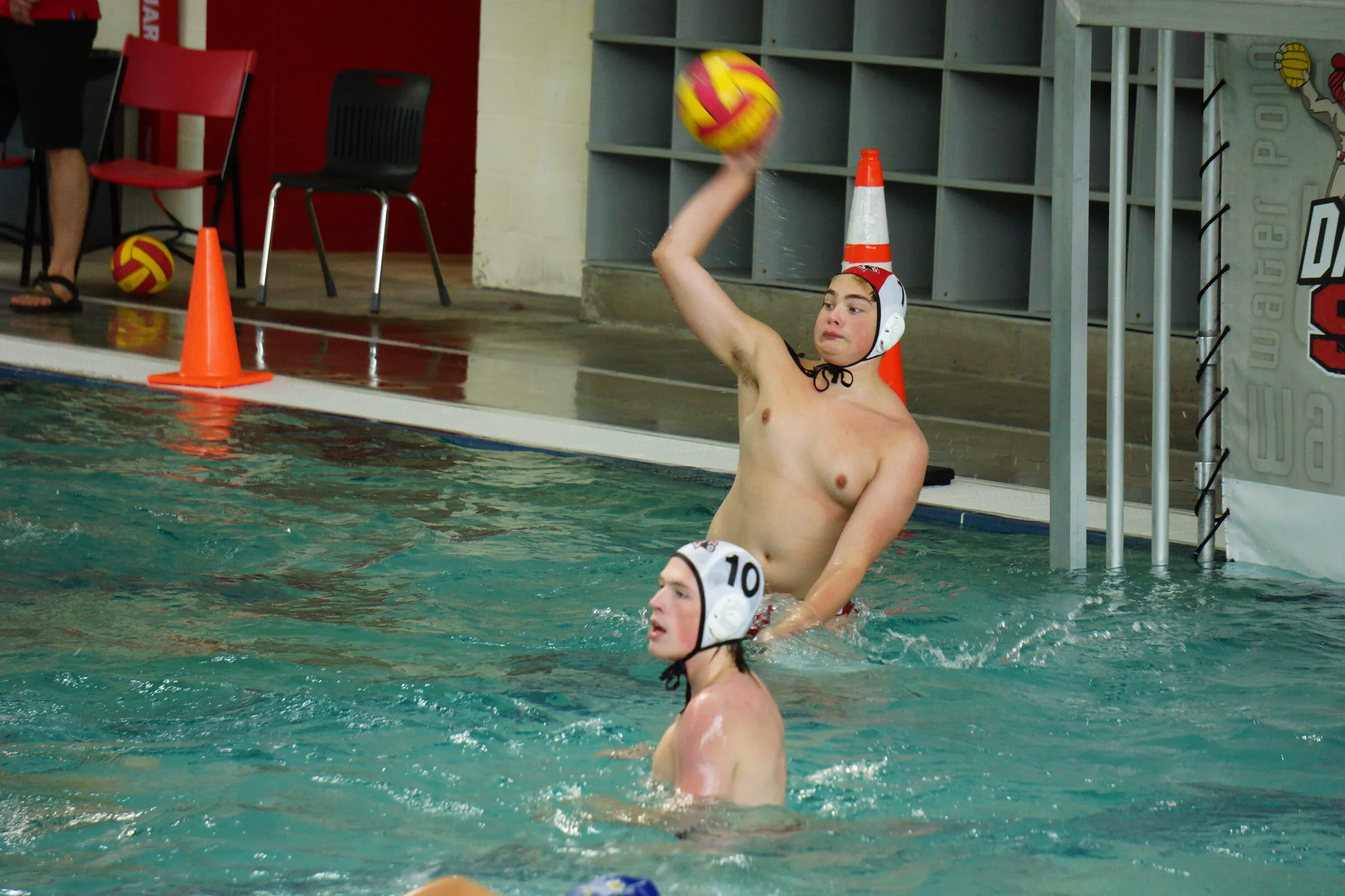A player rises out of the water to shoot